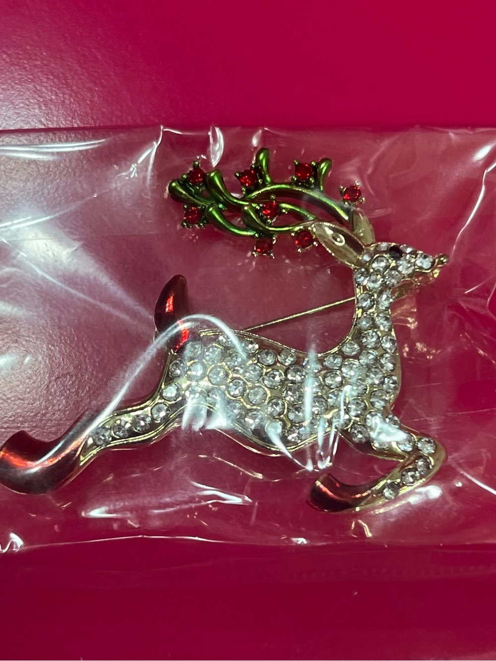 Crystal Pave Reindeer Brooch with Green and Red Accent